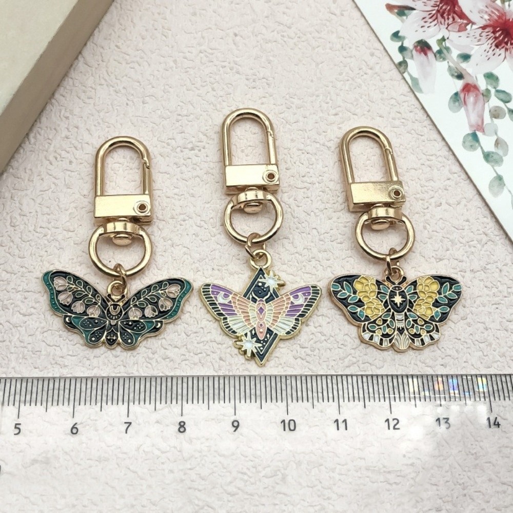 พวงกุญแจผีเสื้อสีสันสวยงาม งาน - Butterfly Rubber Sheet บทวิจารณ์และราคา